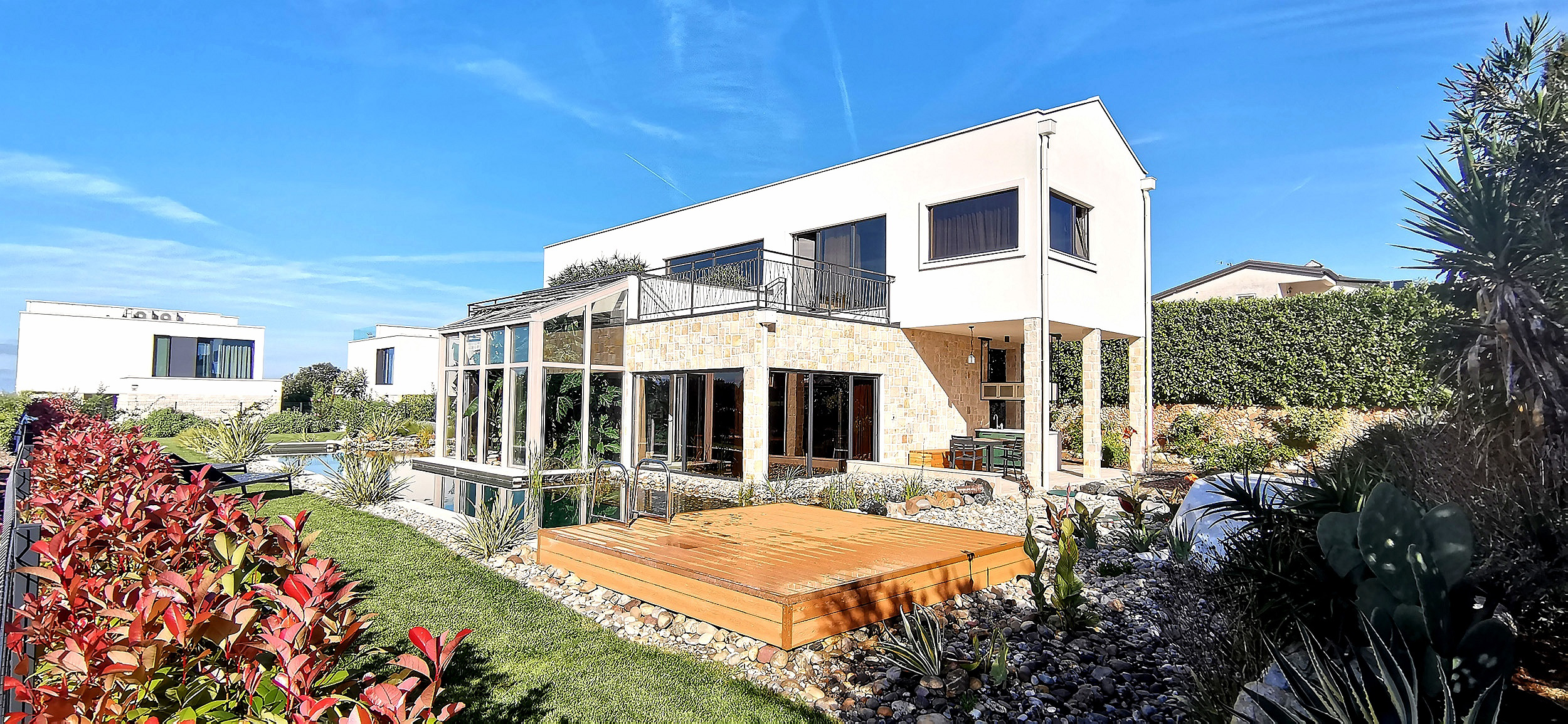 Villa with greenhouse